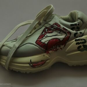 Cream Sneakers with Red Graphics